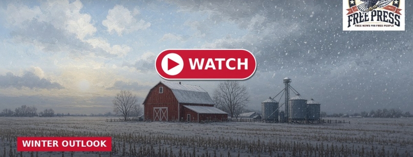 Fostoria News Fostoria winter landscape with snow-covered barn and silos under cloudy sky.